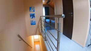 Poschodová posteľ alebo postele v izbe v ubytovaní Bier-Lak Apartman House 71
