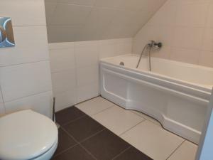 Łazienka w obiekcie Pokoje i Apartamenty u Anny