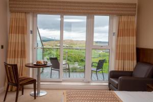 Χώρος καθιστικού στο Strandhill Lodge and Suites Boutique Hotel