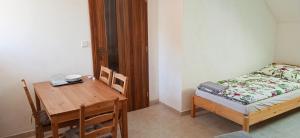 Postel nebo postele na pokoji v ubytování Ubytování U Tajčů