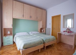 Katil atau katil-katil dalam bilik di Albergo Italia +17 gambar
