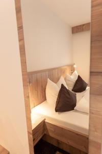 Posteľ alebo postele v izbe v ubytovaní Senner Appartements