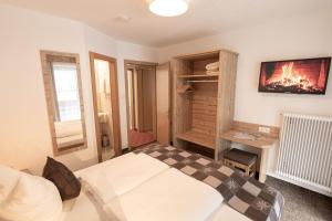 Posteľ alebo postele v izbe v ubytovaní Senner Appartements