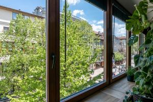 Vonkajšia záhrada v ubytovaní Ethnica Apart & Gallery