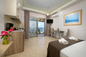 Postel nebo postele na pokoji v ubytování Villa Boukari Beach
