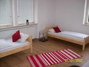 Posteľ alebo postele v izbe v ubytovaní Ferienwohnung Lamm