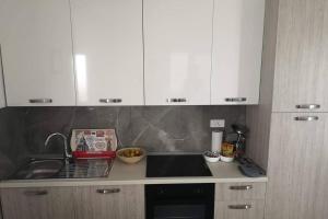 Kuchyň nebo kuchyňský kout v ubytování Apartman Mia