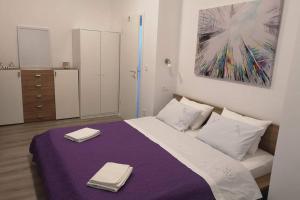 Postel nebo postele na pokoji v ubytování Apartman Mia