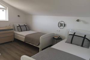 Postel nebo postele na pokoji v ubytování Apartman Mia