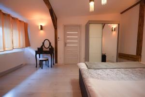 Ένα ή περισσότερα κρεβάτια σε δωμάτιο στο Aparthotel Zabrze, Apartamenty w Centrum z prywatnym parkingiem