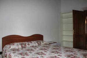 Postel nebo postele na pokoji v ubytování Casa Vacanza Il Laghetto Bea