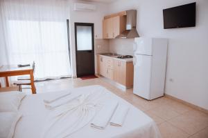 Η κουζίνα ή μικρή κουζίνα στο Hotel Perdja