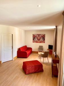 Posezení v ubytování Hotel l'Orée Des Vignes