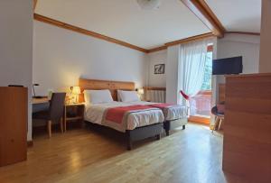 Katil atau katil-katil dalam bilik di Hotel Croux