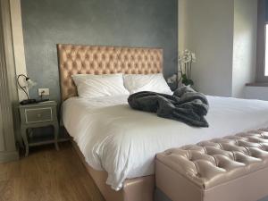 Postel nebo postele na pokoji v ubytování Villa Ciardi Wellness Hotel & Ristorante