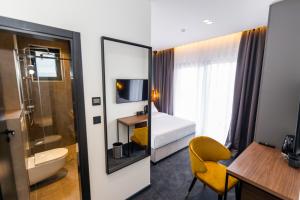 Koupelna v ubytování Boutique ROOMs 76