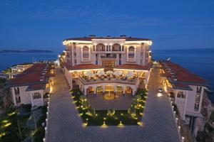 an aerial view of a large building with lights at Birun Ada Hotel in Istanbul