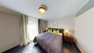 Postel nebo postele na pokoji v ubytování Ostsee Elmenhorst Sehr hochwertige Dreizimmer Ferienwohnung mit Gartenterrasse