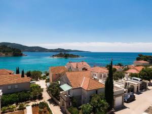 a view of a town and the ocean at Villa Gradina in Vela Luka
