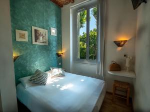 Postel nebo postele na pokoji v ubytování Altera Roma Hôtel