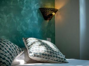 Letto o letti in una camera di Altera Roma Hôtel