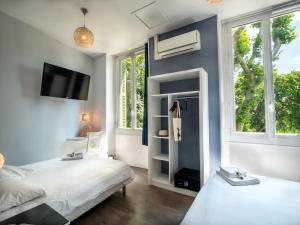 Letto o letti in una camera di Altera Roma Hôtel