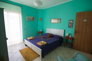 Postel nebo postele na pokoji v ubytování B&B Miroca