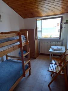 Postel nebo postele na pokoji v ubytování B&B Isabella