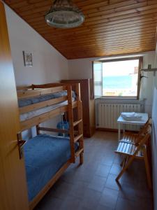 Postel nebo postele na pokoji v ubytování B&B Isabella