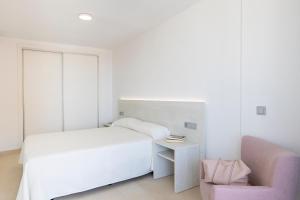 Postel nebo postele na pokoji v ubytování Aparthotel BCL Levante Lux