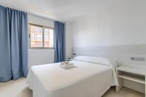 Postel nebo postele na pokoji v ubytování Aparthotel BCL Levante Lux