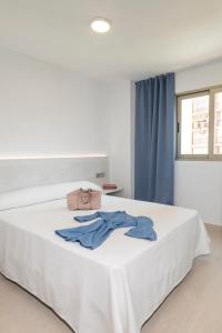 Postel nebo postele na pokoji v ubytování Aparthotel BCL Levante Lux