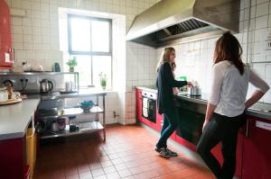 A kitchen or kitchenette at The Burren Hostel - Sleepzone