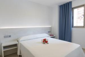 Postel nebo postele na pokoji v ubytování Aparthotel BCL Levante Lux