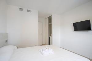 Postel nebo postele na pokoji v ubytování Aparthotel BCL Levante Lux