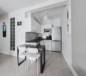 Kuchyňa alebo kuchynka v ubytovaní Apartment 1A