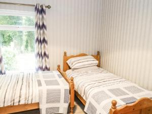 Postel nebo postele na pokoji v ubytování Sean Bhaile