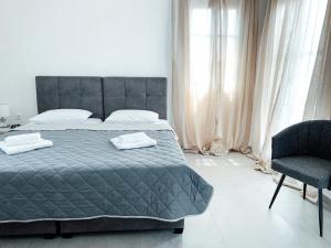 Cama ou camas em um quarto em Fabrica Sunset Apartments