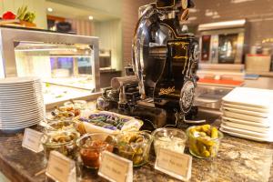 a kitchen counter with a food at Europa Hotel Kühlungsborn in Kühlungsborn