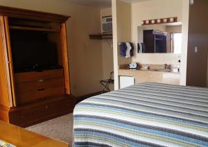 Postel nebo postele na pokoji v ubytování Bristlecone Motel