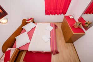 Postel nebo postele na pokoji v ubytování Apartments Šćerbe 3103