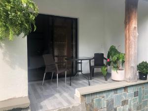 Innanhússgarður eða útisvæði á Cotinga Hotel Spa