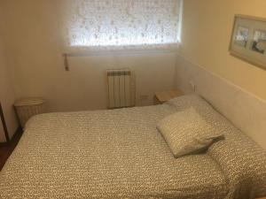 Posteľ alebo postele v izbe v ubytovaní Apartamento Vacacional do Pexigo
