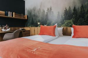 Postel nebo postele na pokoji v ubytování Hotel Drei Quellen Therme