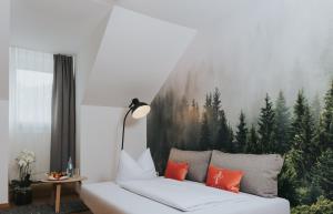 Postel nebo postele na pokoji v ubytování Hotel Drei Quellen Therme