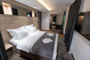 Hotel Borneo客房内的一张或多张床位