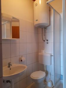 Kúpeľňa v ubytovaní Apartmani Tomić