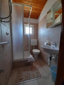 Kúpeľňa v ubytovaní Apartmani Tomić