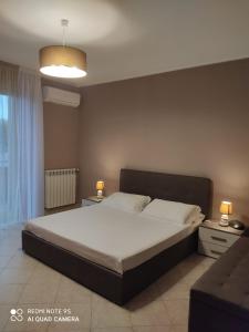 Posteľ alebo postele v izbe v ubytovaní Casa Vacanza - Sole e Azzurro -