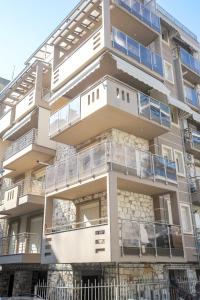 Budova, v ktorej sa apartmán nachádza + 18 fotografií